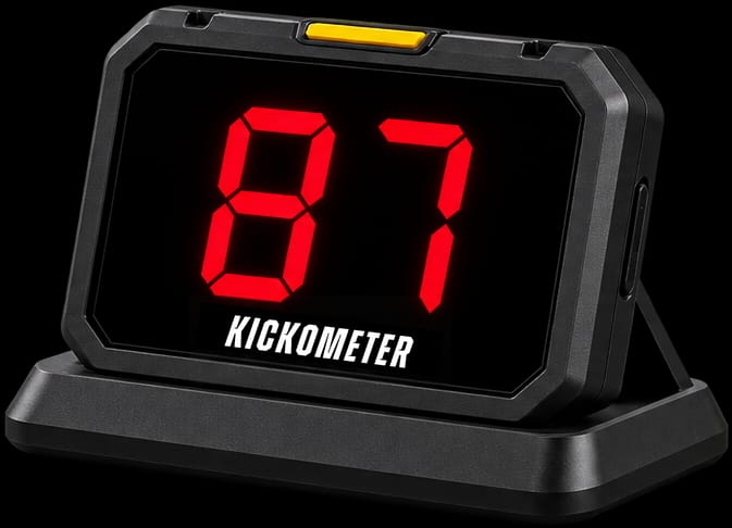Kickometer: a shot-speed display on a low base, showing 87 in red.